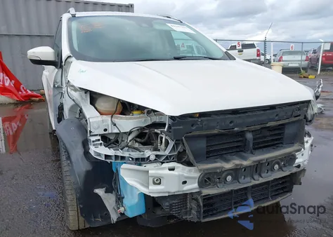 2017 Ford Escape Titanium z USA, uszkodzony, nr VIN 1FMCU9J94HUE48485